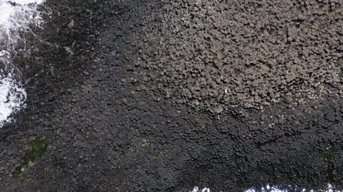 The Giants Causeway lies at the foot of the basalt cliffs along the sea coast on the north shores of