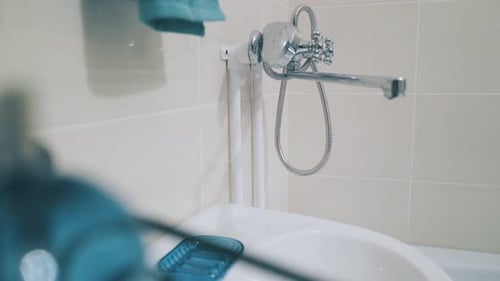 White Bathtub and Silver Faucet in Bathroom