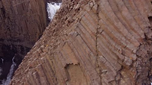 Litlanesfoss is a very beautiful small waterfall on the Iceland - It is carved into basalt rocks