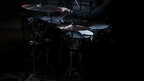 Slow Motion Drummer Plays at The Concert