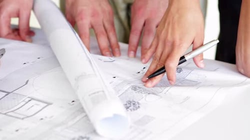 Architectes reprenant les plans