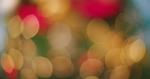 Blurred lights background with golden holiday glow