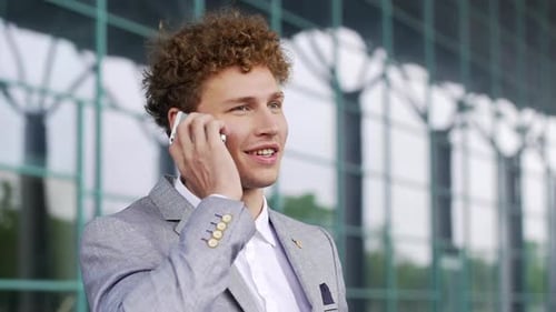 Young Adult on Phone in Urban Setting