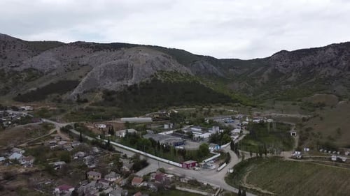 Little Green Town in the Mountains Shooting in a Bird'seye View