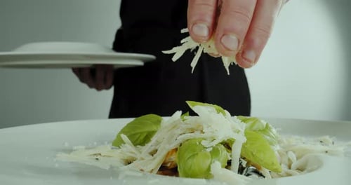 Close Up Footage of a Man Hand Chef Prepares a Salad of Seafood and Vegetables Slow Motion