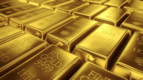 Endless motion of camera closing up the stacked gold bars. Loopable. HD