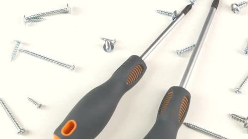Screwdriver with Self-tapping Screw on White, Rotation