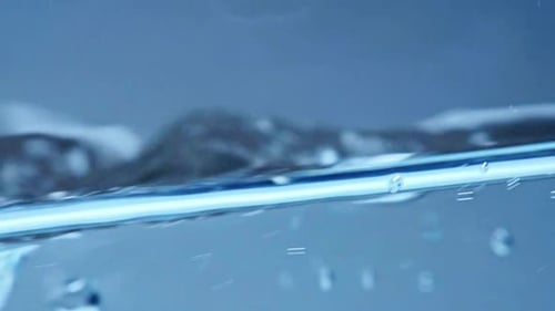Water Surface Ripples with Bubbles and Droplets