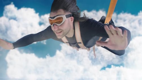Man Skydiving with Blue Sky and Clouds