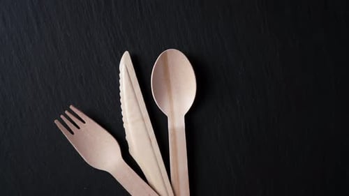 Wooden Cutlery Set on Dark Background