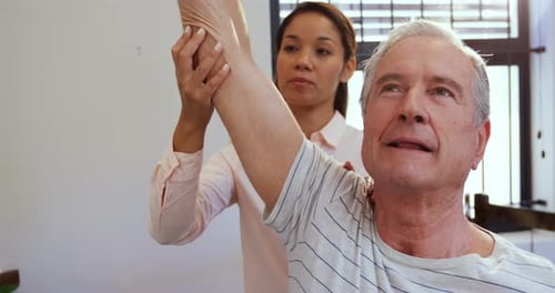 Man Receives Physical Therapy for his Arm