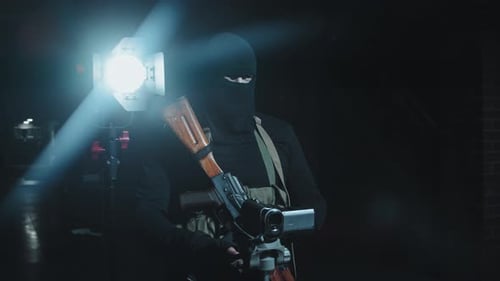 Terrorista armado con cámara de vídeo
