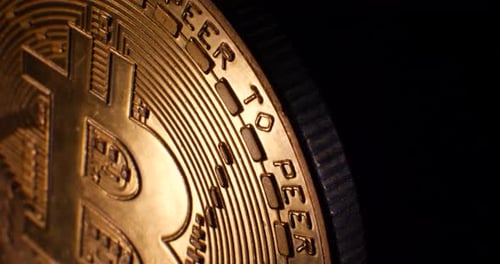 Close up looping shot of a digital peer to peer cryptocurrency bitcoin with room for titles and cryp