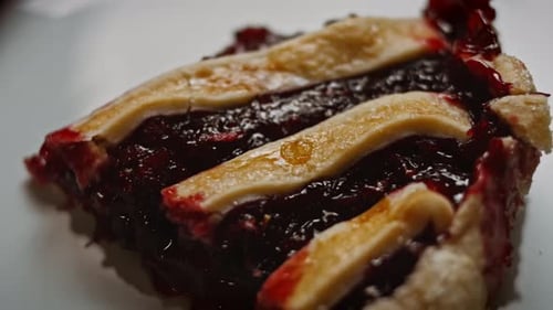 Delicious Slice of Berry Pie on a Plate