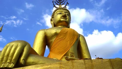Golden Buddha Statue Under Blue Sky