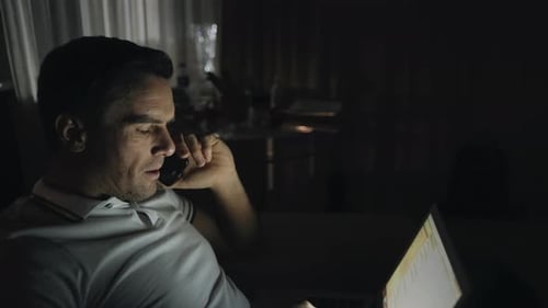 Portrait of Exhausted Boss Working Overnight with Notebook at Remote Workplace