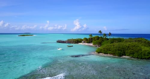 Wide drone island view of a summer white paradise sand beach and aqua blue ocean background in vibra
