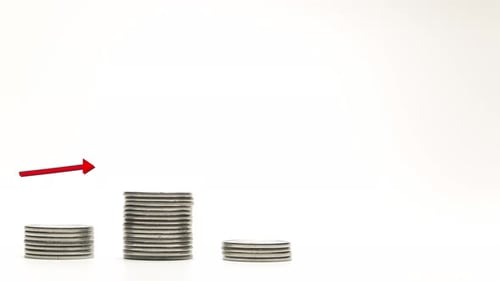 Stacks of Coins Growing with Rising Arrow Graphic