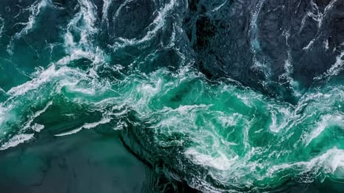 Waves of Water of the River and the Sea Meet Each Other During High Tide and Low Tide