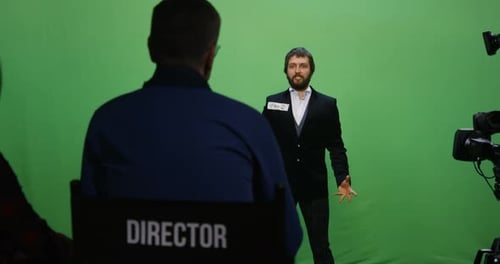 Actor Performing in Front of Cameras on Green Screen