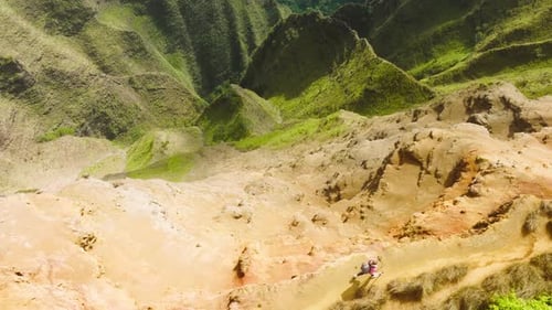 Drone Young Tourist Hiker Woman with Backpack Walking Up on Top of Mountain