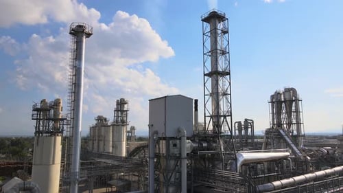 Aerial View of Oil and Gas Refining Petrochemical Factory with Tall Refinery Plant Manufacture