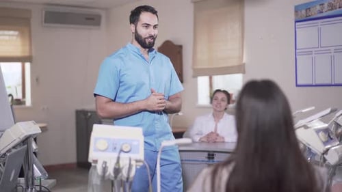 Doctor Presenting to Medical Professionals in Bright Office