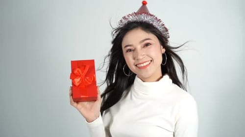 Smiling Woman Holding Birthday Present