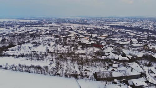 Drone high altitude snow covered old style house architecture winter snow