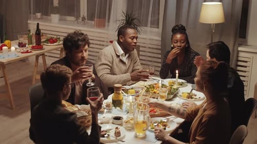 Friends Gather Together for Dinner and Conversation