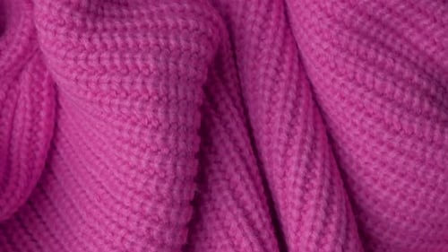 Magenta Knitted Fabric Texture Close Up