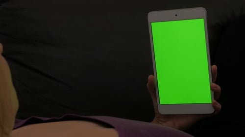 Holding green screen PC tablet and resting at home and chroma key tablet 4K 2160p 30fps UltraHD fo