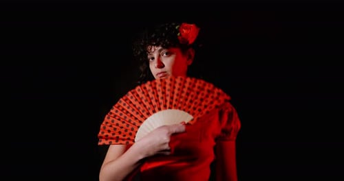 Woman with Rose Posing with Fan