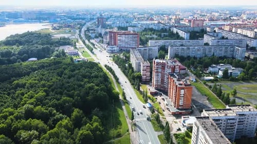 Urban aerial view of beautiful Russian city on blue sky sunny day. Drone footage