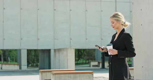 Beautiful Woman Going To Work With Coffee Walking Near Office Building Portrait Of Successful