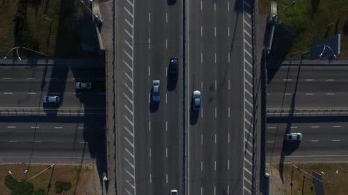 Drone View Car Driving on Highway Bridge. Top View Car Traffic on Highway Flyove