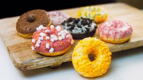 Colorful Donuts with Frosting and Toppings