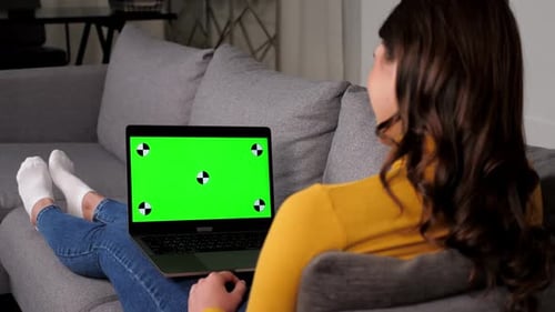 Green Screen Laptop Laughing Woman Watching Comedy Movie or TV Series at Home
