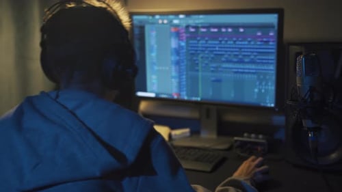Teenager at Home Composes Music In His Home Sound Studio