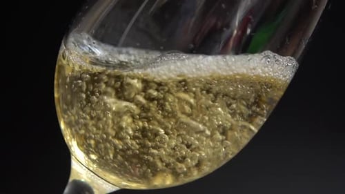Champagne Being Poured Into a Glass Close Up