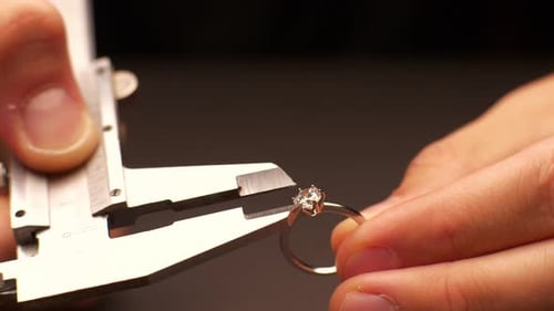 Ring Measured with Caliper in Close Up Footage