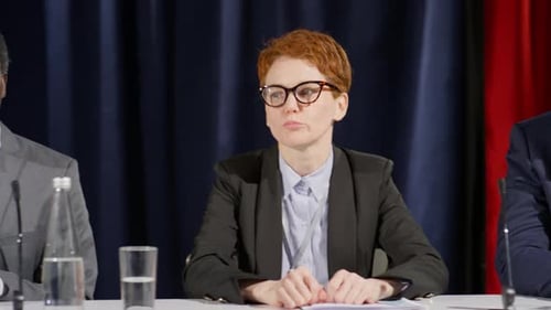 Panel of Speakers at a Corporate Conference