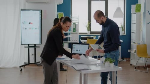 Business Team Analyzing Data in Modern Office