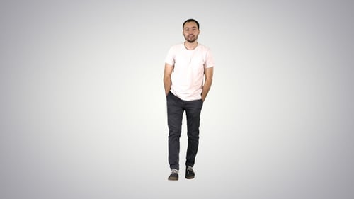 Man Walks Casually Toward Camera on White Background