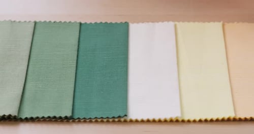 Fabric Swatches in Greens, Yellows, Whites, and Blues