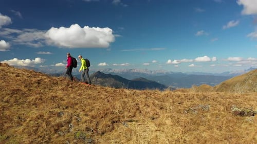 Aerial Drone View Couple Hiking on Mountain Ridge Part I