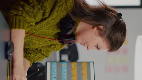Young Woman Working at Office Tablet