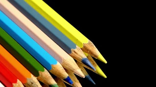 Line of Colored Pencils on Black, Reflection, Rotation