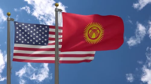United States and Kyrgyzstan Flags Waving in Blue Sky