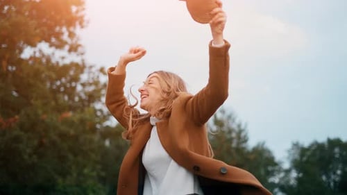 Woman Enjoying Fall Season Outdoors in Nature